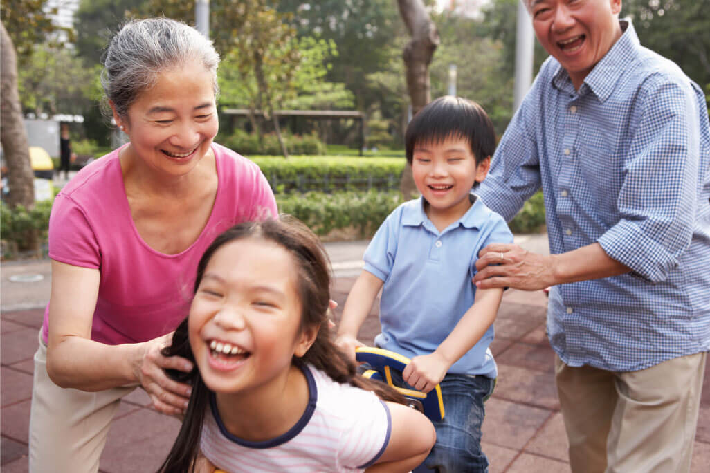 grandparents playing with their grandkids